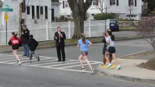 Wellesley School Superintendent David Lussier roots on mini-marathoners