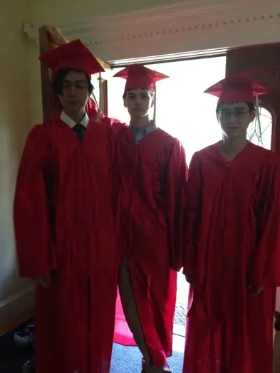 Grads (L to R) Chris Chan, Brian Rappaport, Yutong Yang heading to ceremony