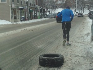 tire running guy wellesley square
