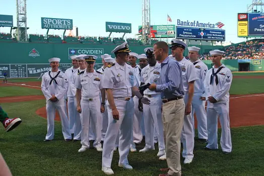 Sam Kennedy presented New Hampshire flag by Navy personnel during Red Sox game in 2011 wellesley