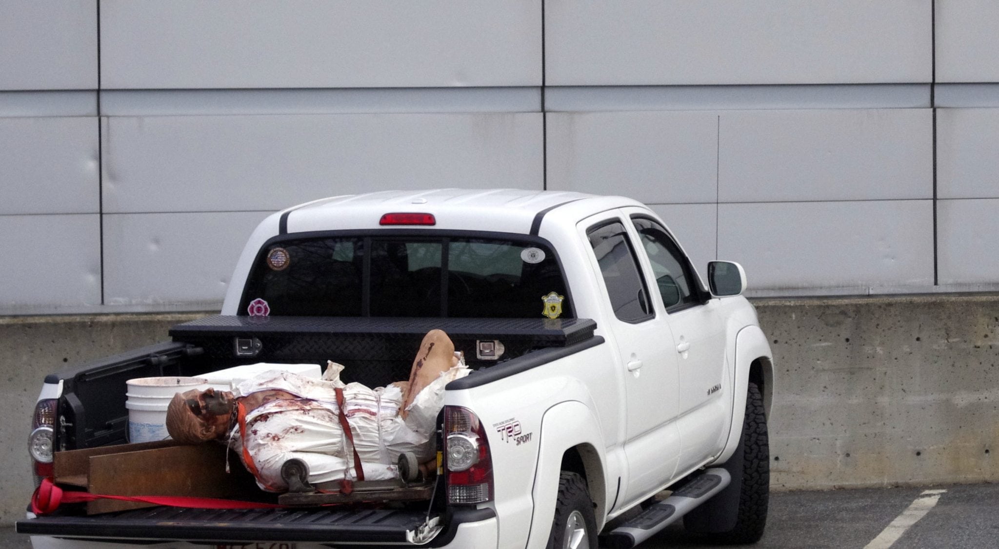 pickup with body in back of Wellesley Fire Station on Rte 9