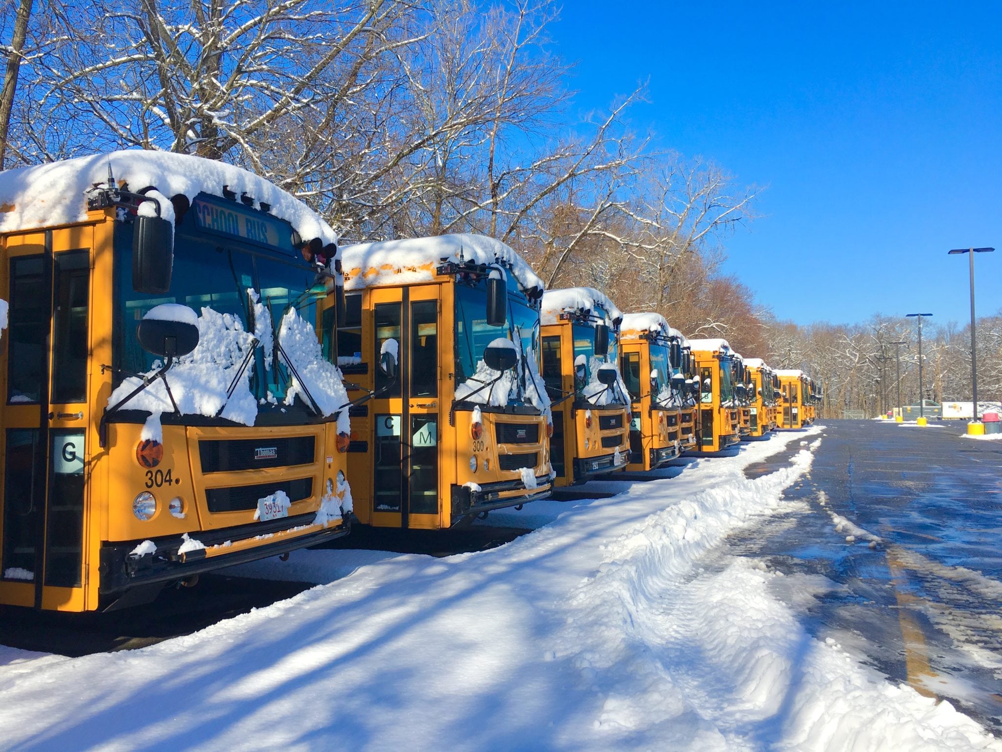 School buses. Mass Bay Community College