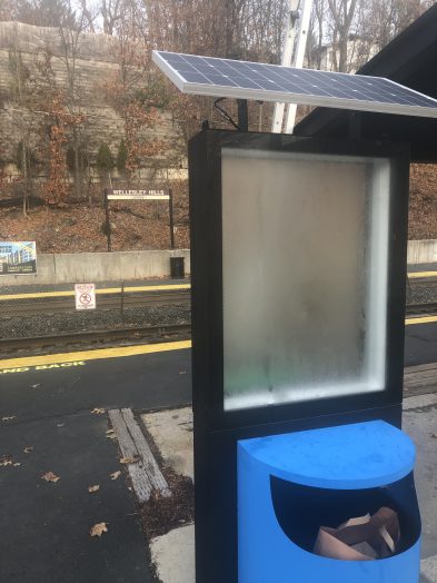 solar-powered display at Wellesley Hills train station