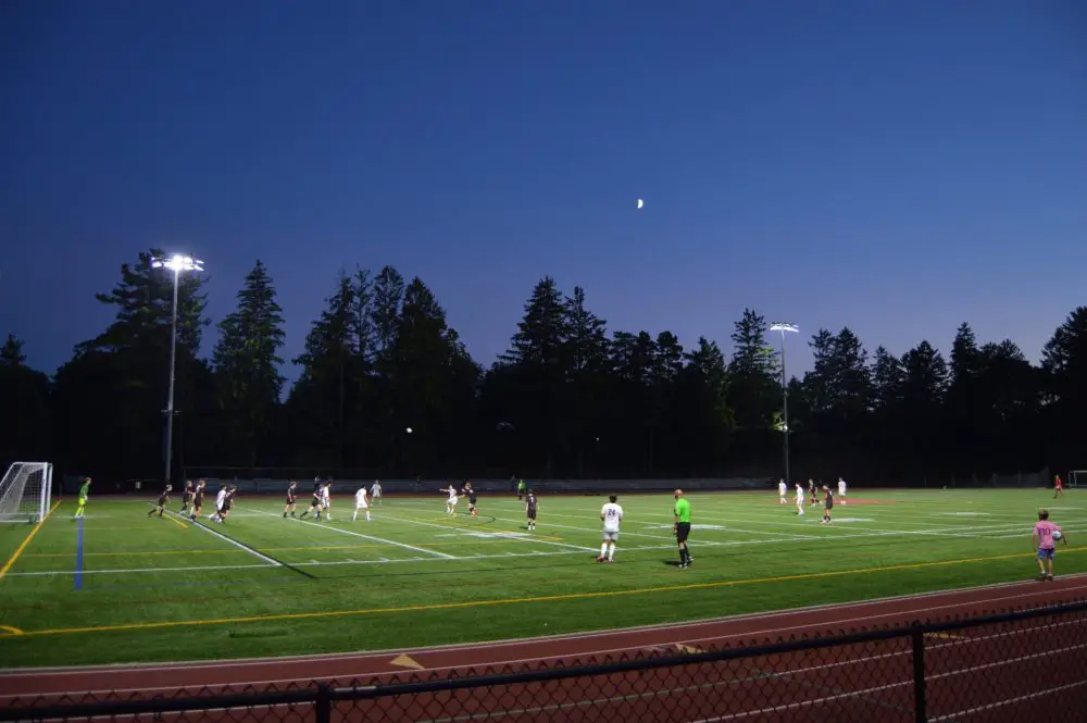 Wellesley boys soccer under the lights