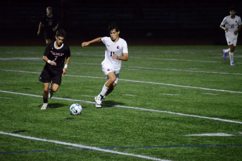 Wellesley boys soccer under the lights