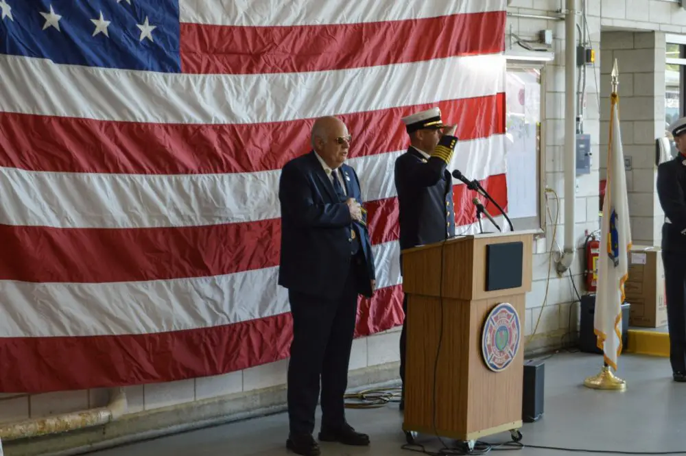 Pledging allegiance to the flag at 9/11 ceremony