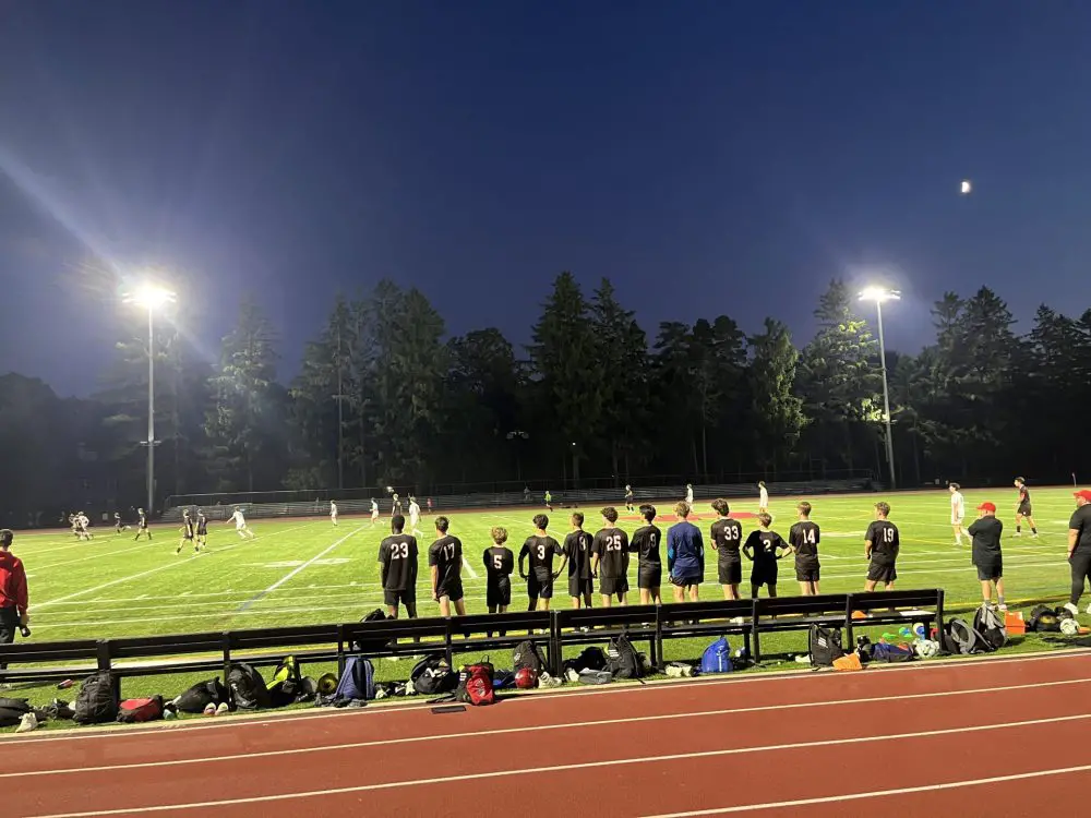 Wellesley boys soccer under the lights