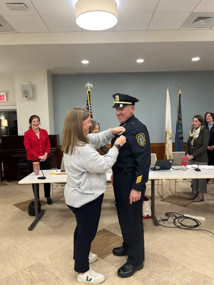 New Wellesley Police Deputy Chief Jeff Renzella gets pinned by wife Maura