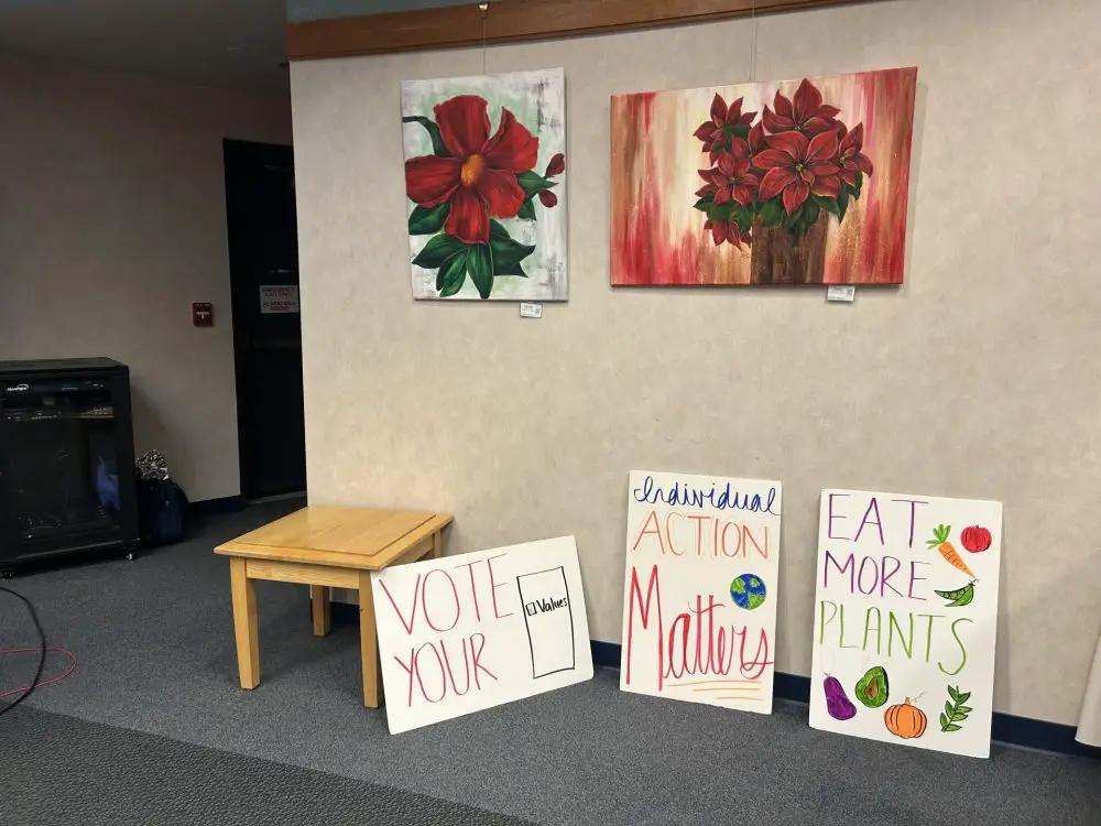 Sustainable Wellesley displayed posters encouraging environmentally-friendly practices around the Wakelin Room at the Wellesley Public Library.