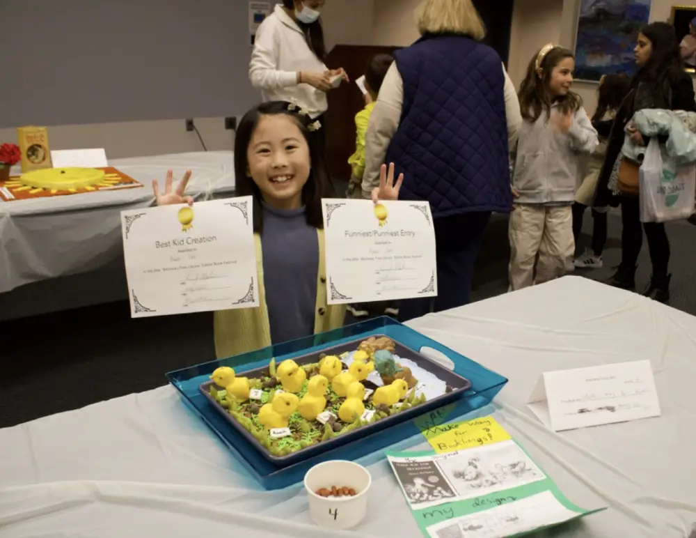 8-year-old Avery Lee, who won Best Kid Creation and Funniest/Punniest Entry for her “Make Way for Booklings” design.